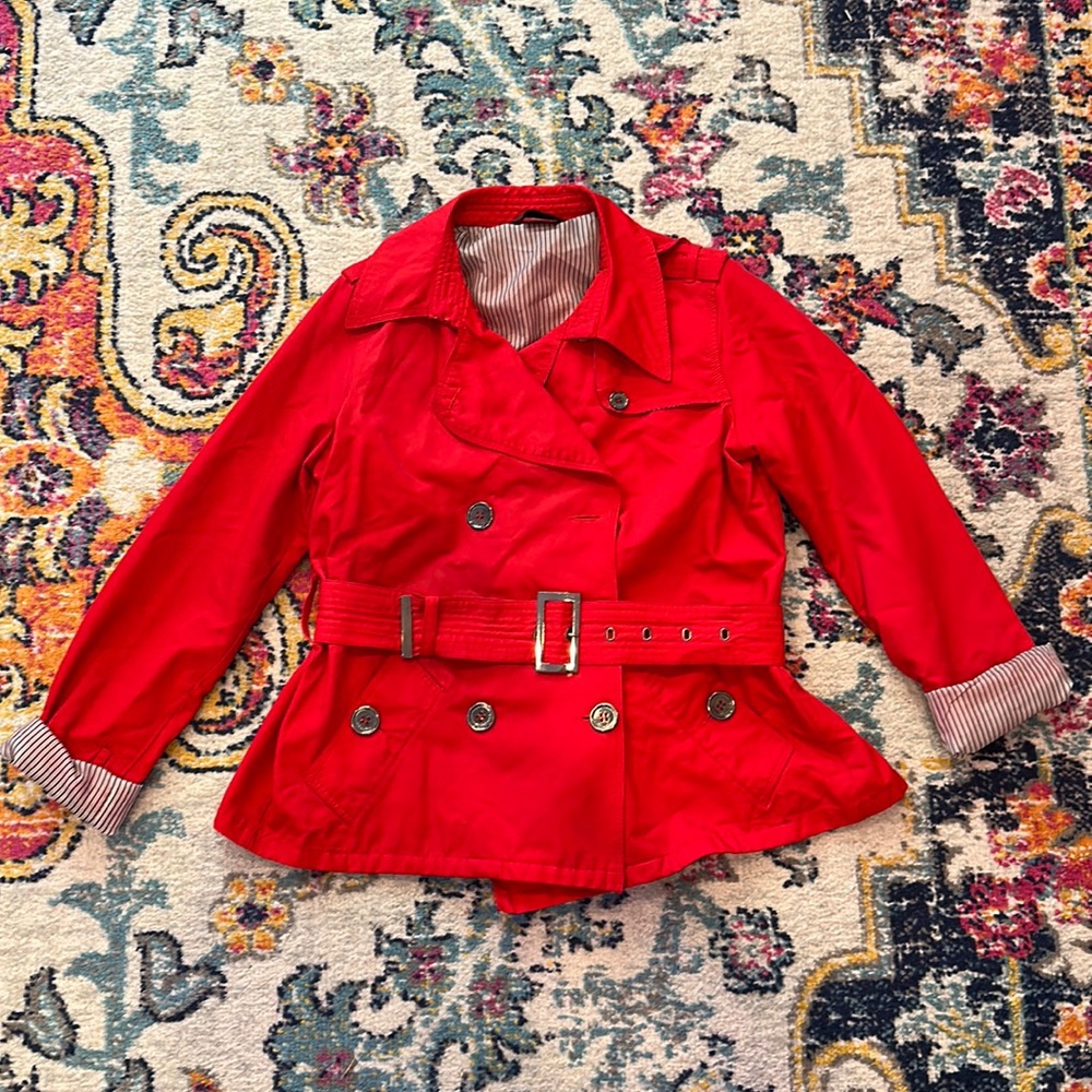 Cute red rain coat with belt.